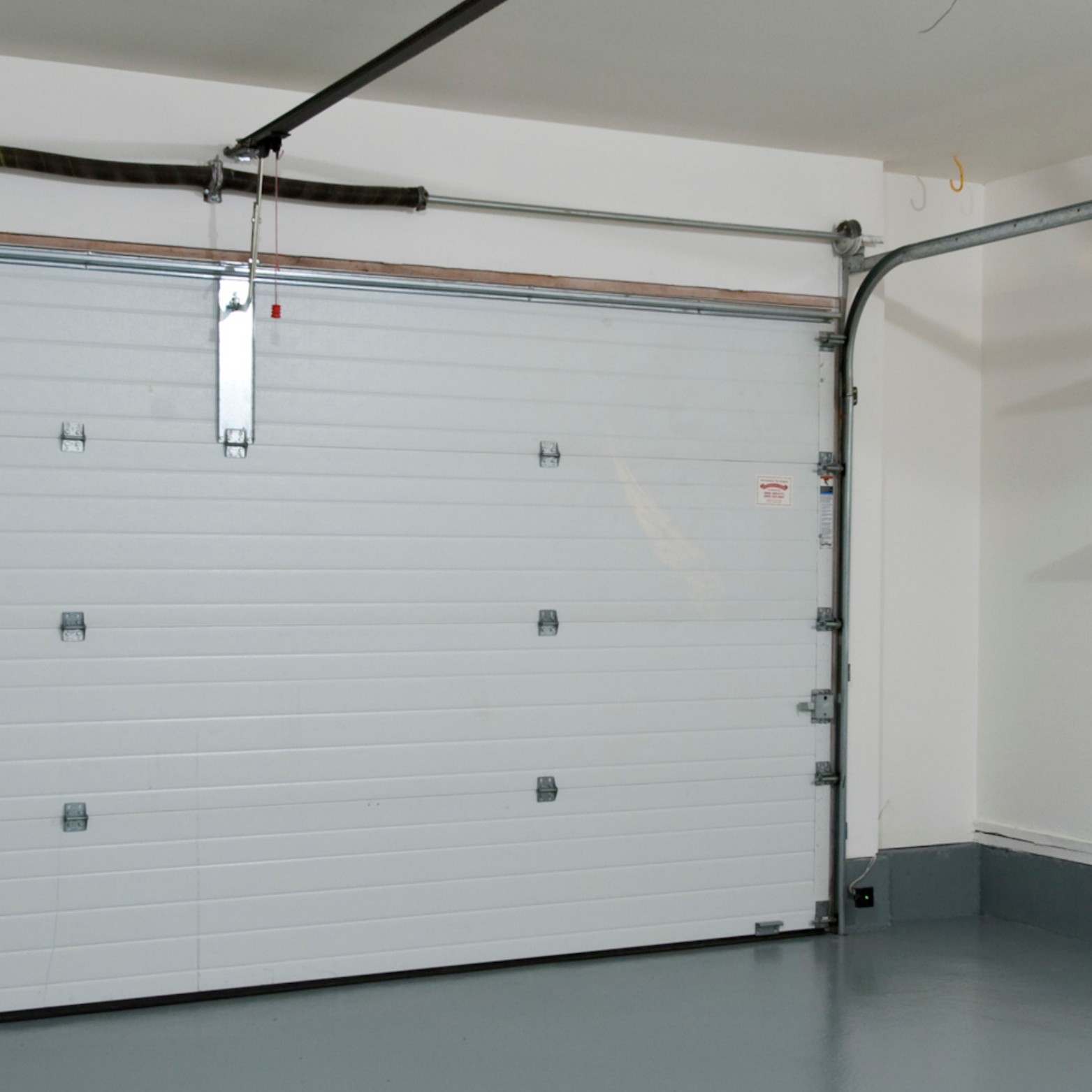 Torsion vs Extension Springs: What's on Your Garage Door?